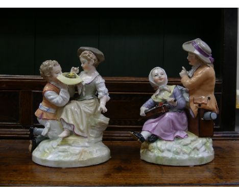 A pair of 19th Century KPM Berlin porcelain Groups, one depicting a young boy kneeling offering a young girl his hat filled w