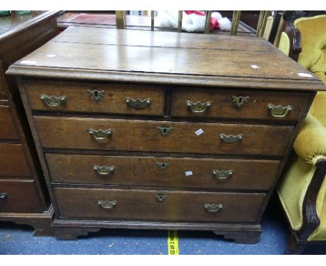 A Georgian oak Chest of Drawers, with two short drawers over three long, raised on bracket feet, 35in (89cm) wide, 20in (51cm