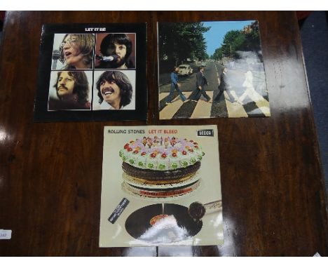 Vinyl Records; The Beatles 'Abbey Road', PCS 7088, with misaligned apple logo on rear of sleeve, together with 'Let it Be', P