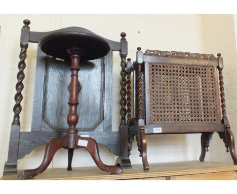 A Mahogany and Bergere Canterbury with barley twist supports, an Oak firescreen and a Mahogany wine table