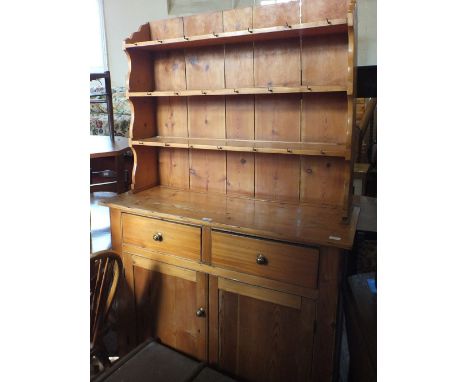 A modern Pine shelf back dresser