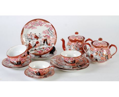 PORCELAIN KUTANI CHINA 14 PIECE TEA SERVICE FOR FOUR PERSONS, decorated with geishas in garden settings, comprising; tea pot,