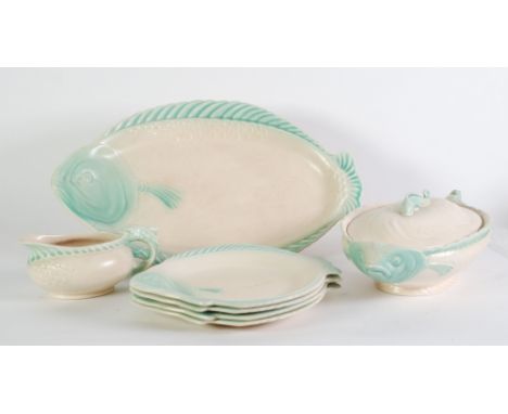 SEVEN PIECE BURLEIGH WARE MOULDED POTTERY FISH SERVICE FOR FOUR PERSONS, modelled as flat fish, cream glazed and heightened i