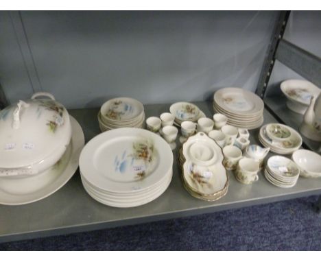A COMPREHENSIVE INTER-WAR YEARS JAPANESE DINNER AND TEA SERVICE, decorated with river landscapes, approximately 76 pieces 
