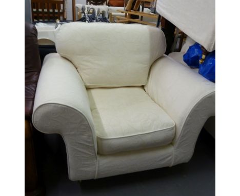 A LOUNGE SUITE OF FOUR PIECES, COVERED IN WHITE LINING AND THE CREAM EMBOSSED SELF COLOURED COVERS, VIZ, A THREE SEATER SETTE