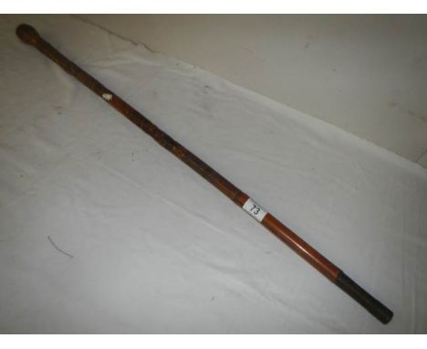 A good antique Chinese bamboo style walking stick with bone inlay.