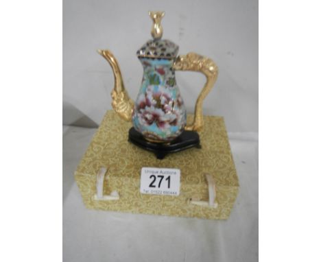 A boxed pretty gilded miniature cloisonne teapot.