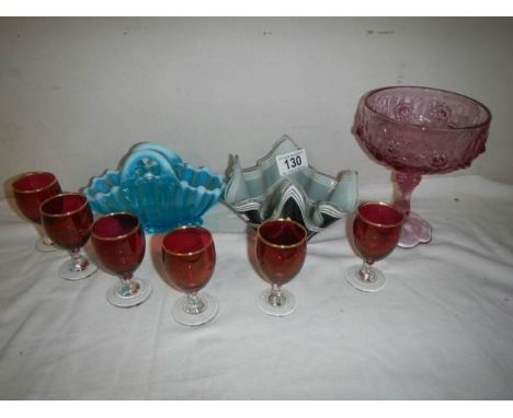 A mixed lot of coloured glass including wine goblets.
