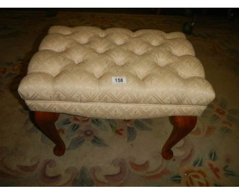 A superb quality deep buttoned stool.
