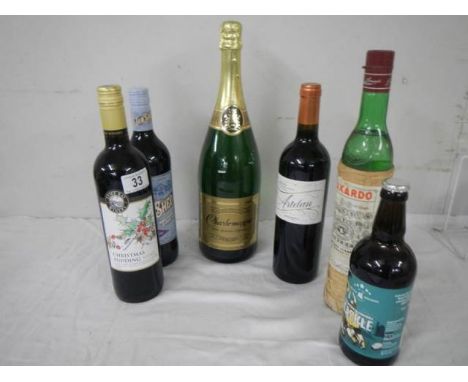 A bottle of Charlemagne and other wine.
