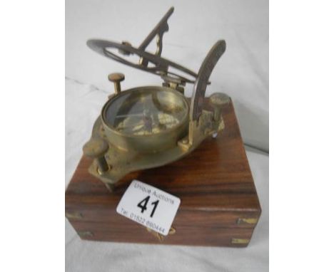 A good 20th century cased brass compass.