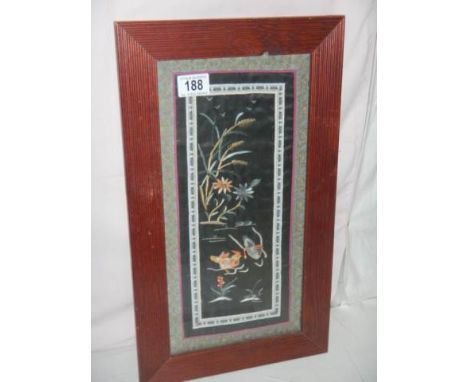 An oak framed Chinese embroidery on silk.