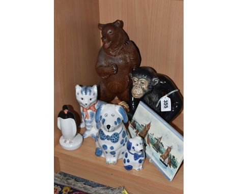 A GROUP OF RYE POTTERY AND OTHER ANIMAL FIGURES, comprising two Rye Pottery dogs wearing bow ties, height of largest 14cm, a 