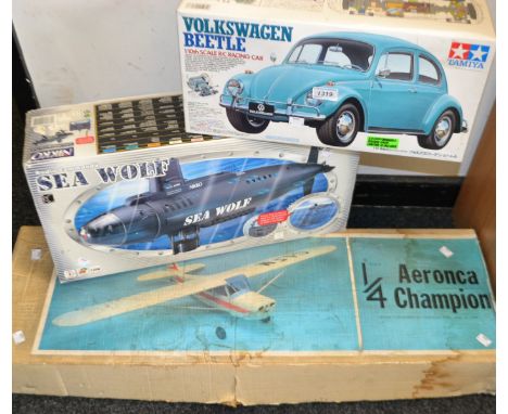 Toys and Juvenalia - a Precedent 1/4 scale Aeronca Champion, boxed; a Nikko Sea Wiolf, boxed; a Tamiya Volkswagen Beetle, box