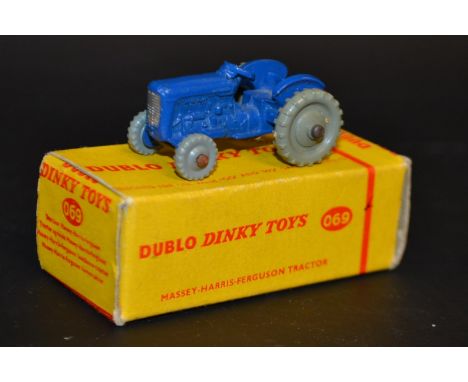 Dinky Dublo No.069 Tractor - blue, knobbly grey plastic wheels, yellow and red plain card box.
