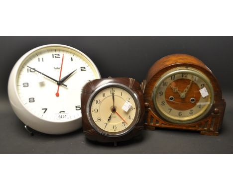 A Smiths Sectric bakelite Art Deco wall clock, mains electric;  a Smiths Astral school wall clock, mains electric;  an oak ma