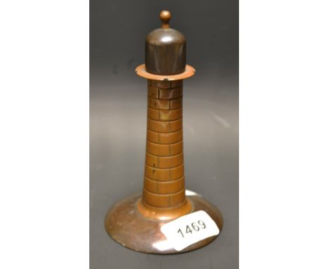 A Trench Art World War One cigarette lighter, as a lighthouse
