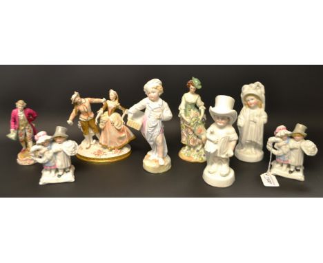 A Sitzendorf figural group of a dancing couple ; other Continental figures 