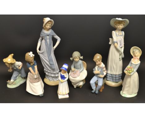 A Spanish Nao figure of a girl in a bonnet, another, a Nao figure of a boy with an injured hound companion, other similar; A 