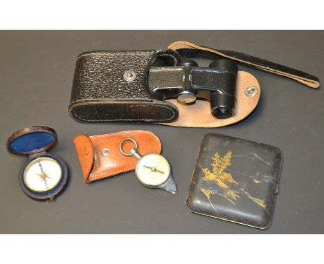Gentleman's items - a leather cased pocket compass, another;  a pair of Russian pocket binoculars, cased, a Japanese lacquere