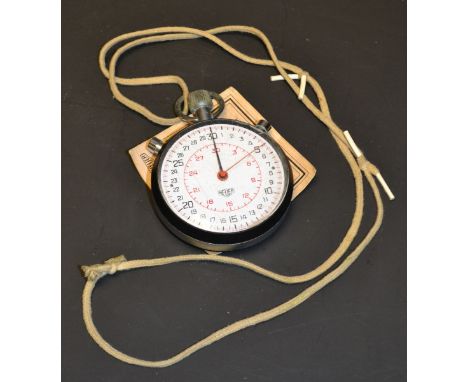 A 1960s Heuer manual stopwatch, with original purchase document