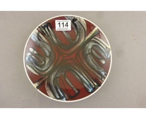 Poole Pottery plate number 3 in dark red ground colour