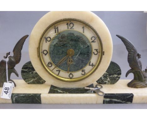 Art Deco marble based mantle clock with spelter bronzed peacock decoration