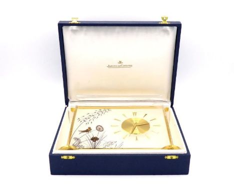 A Jaeger le Coultre  "Sunburst" Marina table clock with 8 day movement in its presentation satin lined blue case. As the wind