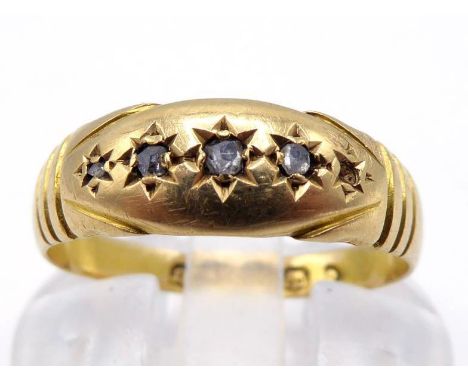 A Victorian 18 carat gold and diamond ring, gypsy set with four small rose cuts (one missing), hallmarked Birmingham 1876), f