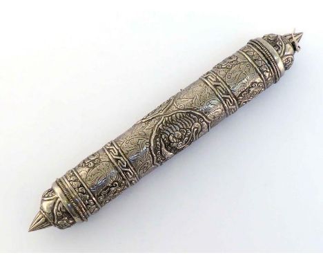 An unmarked white metal scroll holder (tests plated), probably South-East Asian, 20th century, profusely chased with stylised