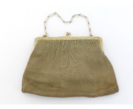 A Continental silver-gilt lady's mesh evening bag, probably Italian, circa 1930, stamped "SILVER", mount pierced and engraved