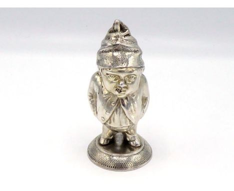 A late Victorian novelty silver spirit lighter by Deakin & Francis, Birmingham, 1892, in the form of a squat man with pointed