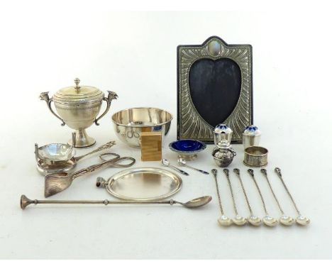 A group of silver and white metal items comprising:- an .800 standard 2-handled covered cup, handles terminating in bird head