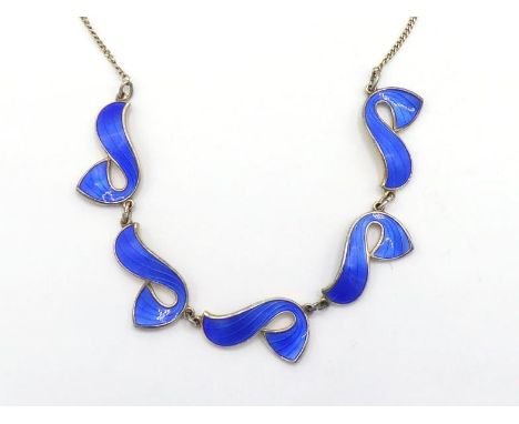 A 1950s Norwegian silver gilt and enamel necklace by Ivar T Holt, composed of stylised wave links, stamped ‘925S NORWAY’ with