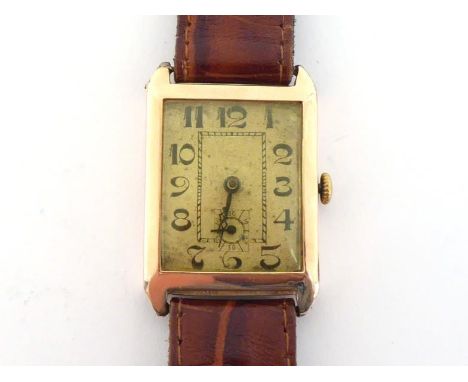 An Art Deco gentleman's 9 carat gold manual wind wristwatch, the case London import marked, the silvered textured dial with b