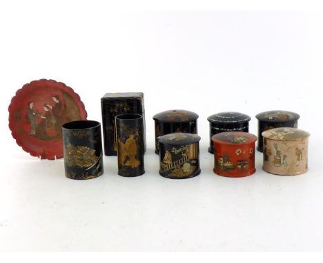 A group of eight lacquered papier mache chinoiserie boxes, including a string box and a mother of pearl decorated example, to