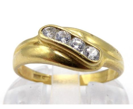 An Italian 18 carat gold and diamond ring, obliquely set to the centre with four brilliants totalling approx. 0.12 carat, Ita