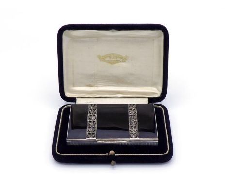 An Austrian Art Deco lady's silver cigarette case retailed by Franz Hiess & Sohne, Vienna, circa 1920, the tortoiseshell cove