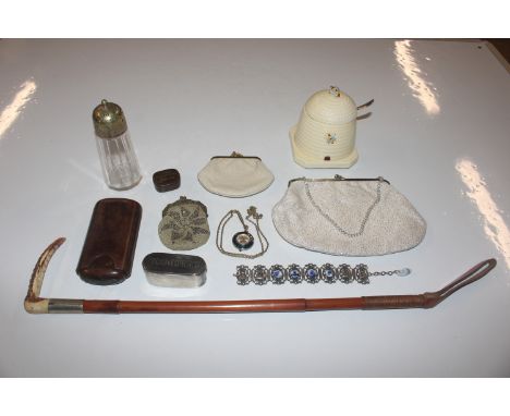 A horn handled riding crop, a box containing honey pot and cover, a sugar sifter, an evening bag and purses, leather cigar ca