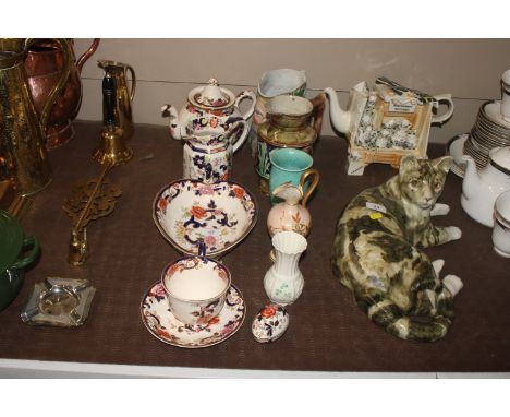 A Belleek vase, a floral decorated ewer, a Royal Lancastrian pottery vase, a character jug, a Majolica type jug, and a collec