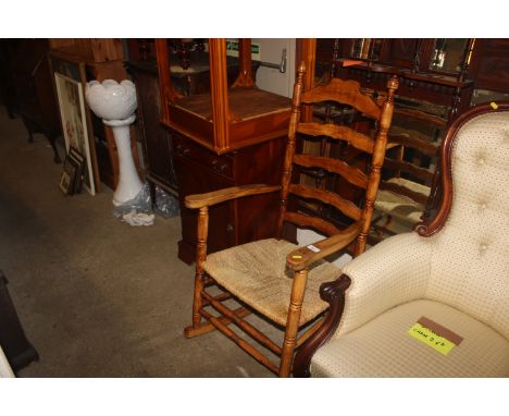 A ladder back rocking chair 