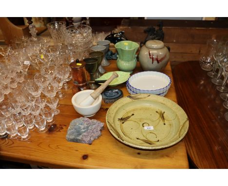 Four pottery goblets, a Lanarth Pottery bowl, a glazed pottery ginger jar and cover with stamp to base, a Poole pottery dolph