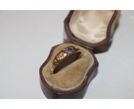 An 18ct gold sapphire and diamond set ring, ring size R/S, approx.  2.5gms