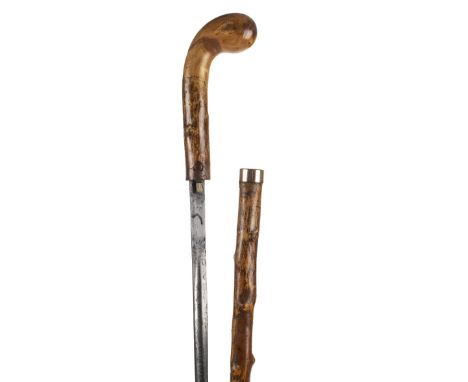 *Walking Cane. Edwardian Sword stick with 69.5cm Toledo blade,  with natural wood grip and shaft, 18ct gold plated collar and