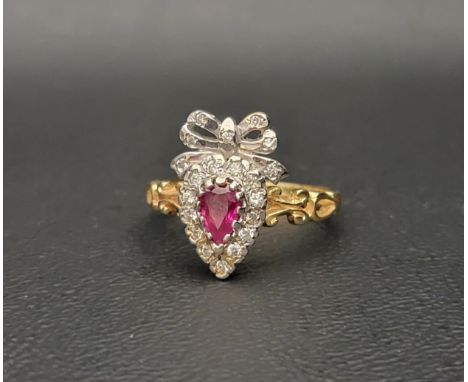 UNUSUAL RUBY AND DIAMOND CLUSTER RINGthe pear cut ruby in diamond surround and surmounted by a diamond set bow, on eighteen c