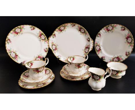 ROYAL ALBERT CELEBRATION TEA SETcomprising eight tea cups and saucers, eight side plates, sugar bowl, milk jug, four cake pla