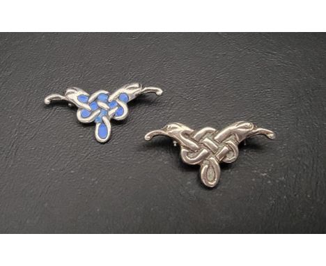 TWO SCOTTISH SILVER BROOCHESboth on Celtic twin headed bird design, one with blue enamel by Iain McCormick and the other by H