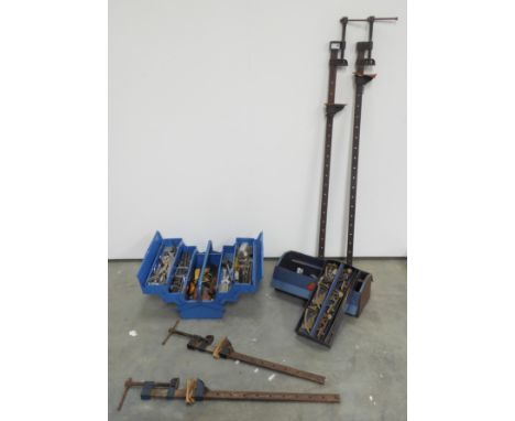 Two tool boxes containing spanners, mole grips, clamps etc, and four 20th century sash clamps L135cm (max)  Condition Report 