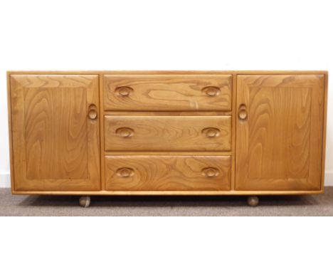 Ercol light elm sideboard, two cupboards and three drawers, W156cm, H68cm, D43cm