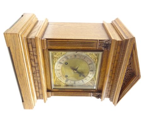 Edwardian oak architectural cased mantle clock, sloped arched top with carved decoration, brass dial with Roman and Arabic si